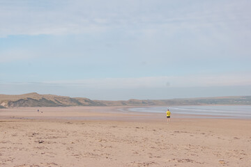 person running on beach