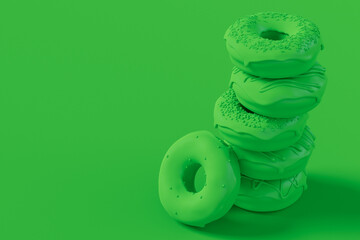 Stack of glazed donut with sprinkles on plain monochrome green color