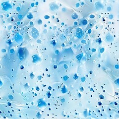 An abstract image of blue water droplets on a glass surface