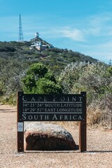 Cape Point Signage With Lighthouse in the Background in South Africa
