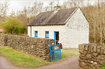 Traditional white and blue painted Irish cottage