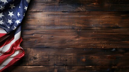 An American flag draped over a dark wooden textured background