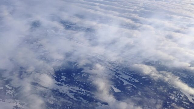 Wilderness of Newfoundland and Labrador Canadian territory with air trail of condensation due to cold temperature  Aerial view