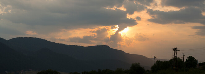 Sunset over the town of Sarnitsa, located in the Western Rhodope Mountains near the Dospat Reservoir.
