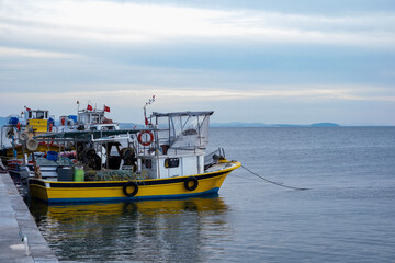 Boats moored in the port of the town. The port of moored fishing boats.