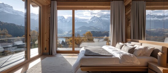 Fototapeta na wymiar Serene Mountain Retreat Bedroom with Panoramic Alpine Landscape Views