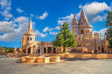 View of the courtyard of the Fisherman's Bastion near the Buda Castle, palace complex on Castle Hill. Popular tourist attraction in Budapest, Hungary - obrazy, fototapety, plakaty