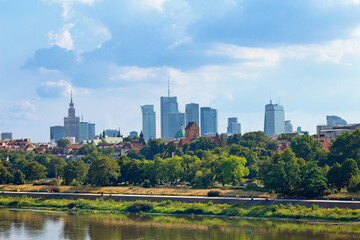 Cityscape - view of the district of Srodmiescie in the center Warsaw, view from the Vistula River, Poland