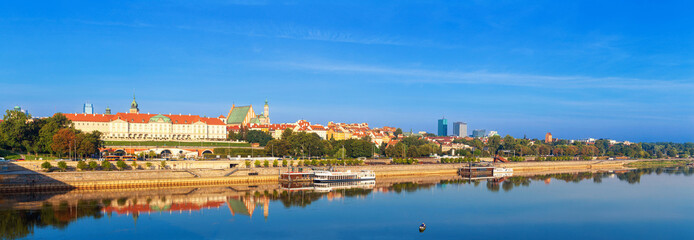 Cityscape, panorama, banner - view of the district of Srodmiescie with the Old Town in the center Warsaw from the Vistula River, Poland