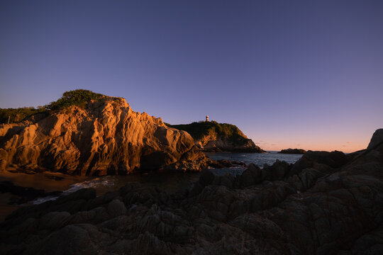 Lighthouse at Faro de Bucerias, Michoacan. Sunset, golden hour