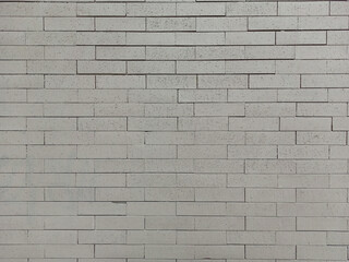 Vintage background texture of an old whitewashed brick wall.