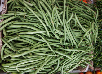 Basket full of fresh green beans vegetables, vegetarian food, stock photo. 