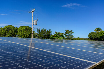 Solar energy panels in a rural green area in Brazil.