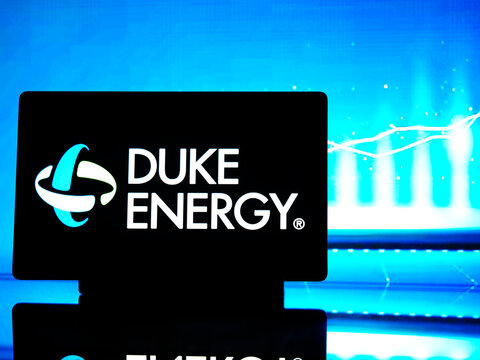 In this photo illustration,  Duke Energy Corporation  logo seen displayed on a tablet