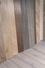Many different samples of wooden flooring indoors
