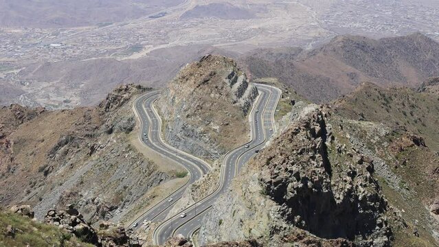 Al Taif , Saudi Aarabia Al Hada Mountain in Taif City, Saudi Arabia with Beautiful View of Mountains and Al Hada road inbetween the mountains. (aerial photography)