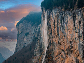 Beautiful aerial view of the Staubbach Falls in Switzerland. Magical panoramic aerial view. 