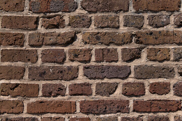 Background texture of a very old brick wall.
