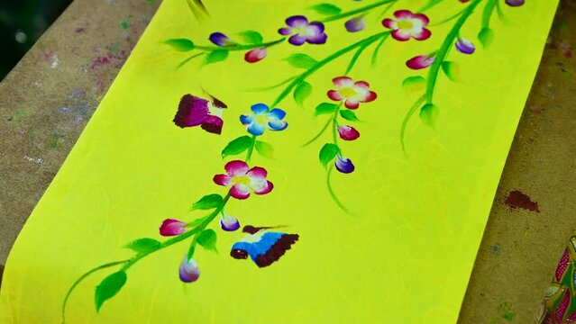 Painting of flowers on mulberry paper in Bo Sang Village, Chiang Mai Province.