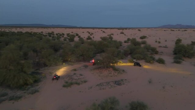 Offroading through the desert at dusk