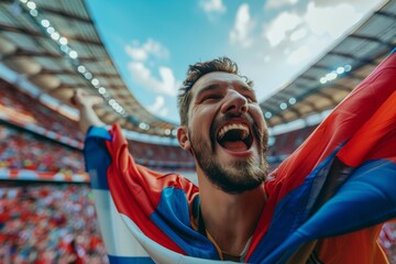 A man is holding a red, white, and blue flag and smiling. Football fans or spectators at the football championship - obrazy, fototapety, plakaty
