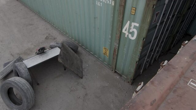 Epic slow motion shot of RC car going off ramp and landing on shipping container