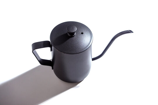 Goose neck kettle isolated on white background. This kettle is usually used by baristas to brew coffee. The gooseneck makes it easy to adjust the water brewing.