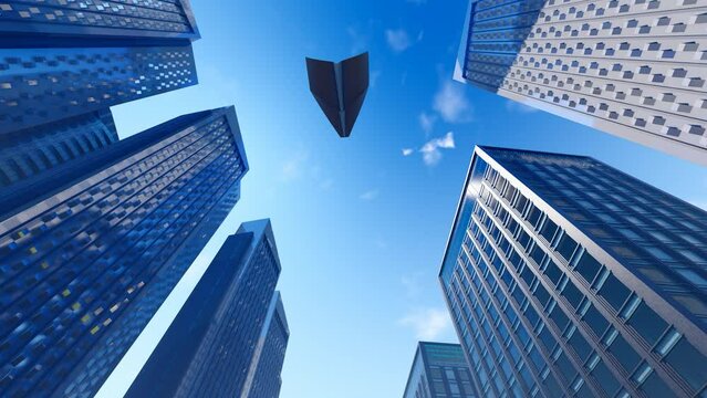 Paper airplane flies over the roof of the Financial Business Building