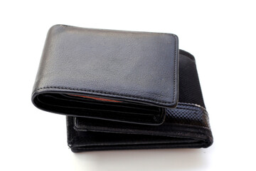 Black wallets on white background.