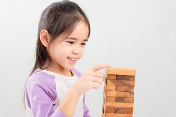 cute girl asia building wood blocks.