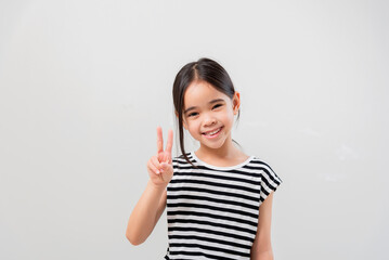 image of Asian child posing Hold up 2 fingers on white background