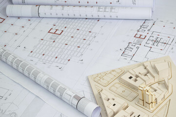Architectural model with architectural, structural and construction drawings. Rolled up plans
