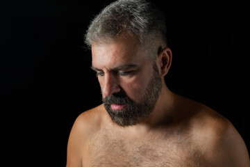 Fototapeta premium Contemplative Midlife: Handsome Man Reflecting