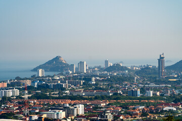 Aerial view of sea shore, beaches with skyline of modern city on the background. Hua Hin, Thailand