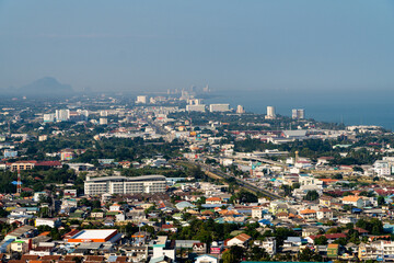 Aerial view of sea shore, beaches with skyline of modern city on the background. Hua Hin, Thailand
