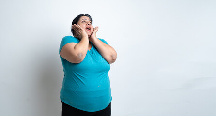 Overweight fat indian woman feeling excited or surprised after weight loss. isolated over white background. Plus size female. Healthcare Concept. Copy Space