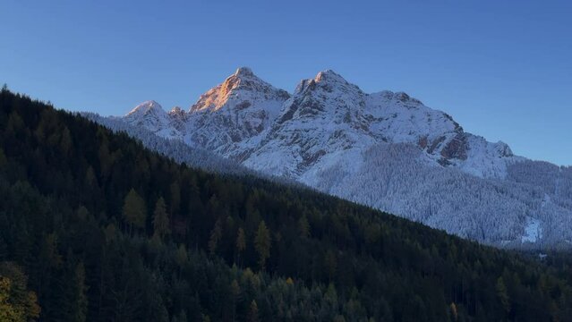 Early November Stubai Stubaital morning first light snow on Europe Australian Swiss Alps peaks fall autumn Village chalet Tirol Tyrol Austria frosted sunshine Innsbruck mountains lark forest landscape