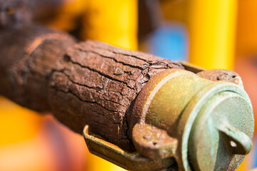 Close-up of corroded steel pipe, corrosion of steel, general corrosion, offshore petroleum pipelines.