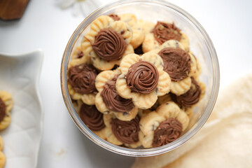 Popular cookies in Malaysia and Singapore during celebration of Eid Mubarak (Hari Raya) on white background. Selective focus and blurry.