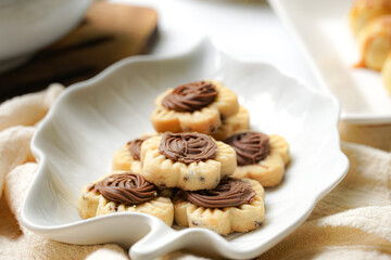 Popular cookies in Malaysia and Singapore during celebration of Eid Mubarak (Hari Raya) on white background. Selective focus and blurry.