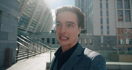 Blogger in business suit captures audience with emotional video his expressions vivid Blogger's eyes convey passion gestures adding depth. Emotion resonates in blogger's every move engaging viewers.