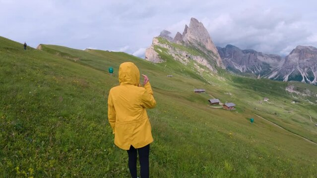 Woman Tourist On Dolomites Mountain Range In Italy - Close Up