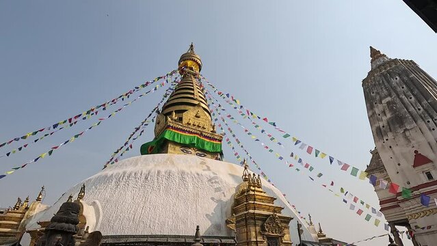 Famous Swayambhu stupa and Pratappur shikara at Swayambhunath Buddhist temple, Kathmandu, Kathmandu Valley, Nepal.