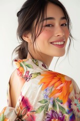 Close-up of a Japanese Super Model in a Flowy Floral Wrap Dress, exuding effortless elegance with a serene smile photo on white isolated background