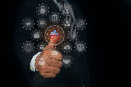 Man using thumb to scan fingerprint. Futuristic digital processing of biometric identification system and mobile phone, Cyber security concept.