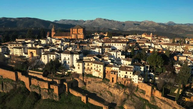 Ronda Puente Nuevo Aerial Drone View in Andalusia Spain moorish town mountain range background, Skyline at touristic village