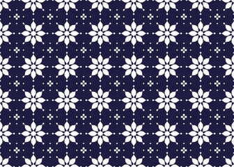 Symbol geometric white flowers design on dark blue background seamless fabric ethnic pattern for cloth carpet wallpaper wrapping etc.