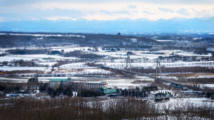 Winter Lanscape of Hokkaido overlooking Tokachigawa Onsen Spa Tourism Concept Travel