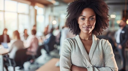 Portrait of young African American female looking camera standing arm crossed in front of colleagues running a business startup or new career path occupation, businesswoman lady lifestyle working - obrazy, fototapety, plakaty