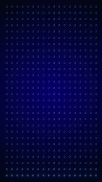 Vertical video animation of an abstract glowing blue LED wall with bright light bulbs - abstract background.